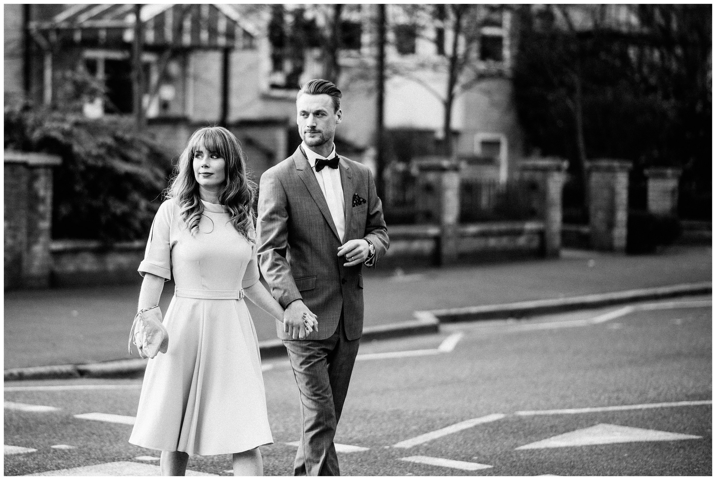 Married couple crossing the road Stoke Newington