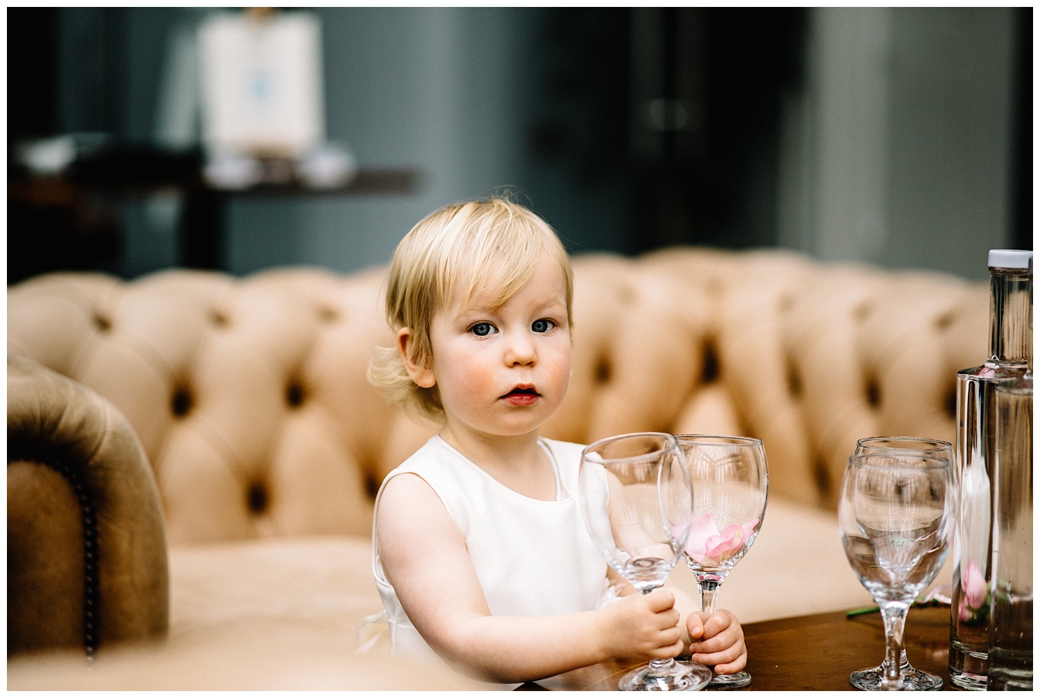 cute flower girl at wedding ceremony in Essendon Country club hertfordshire wedding photographer