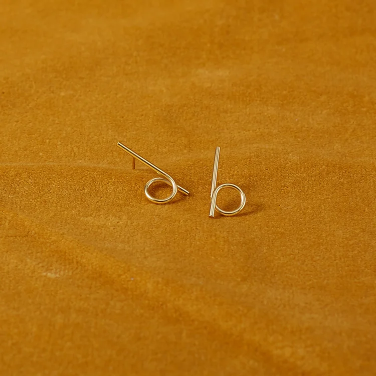 Curl Tail Earrings 1.jpg