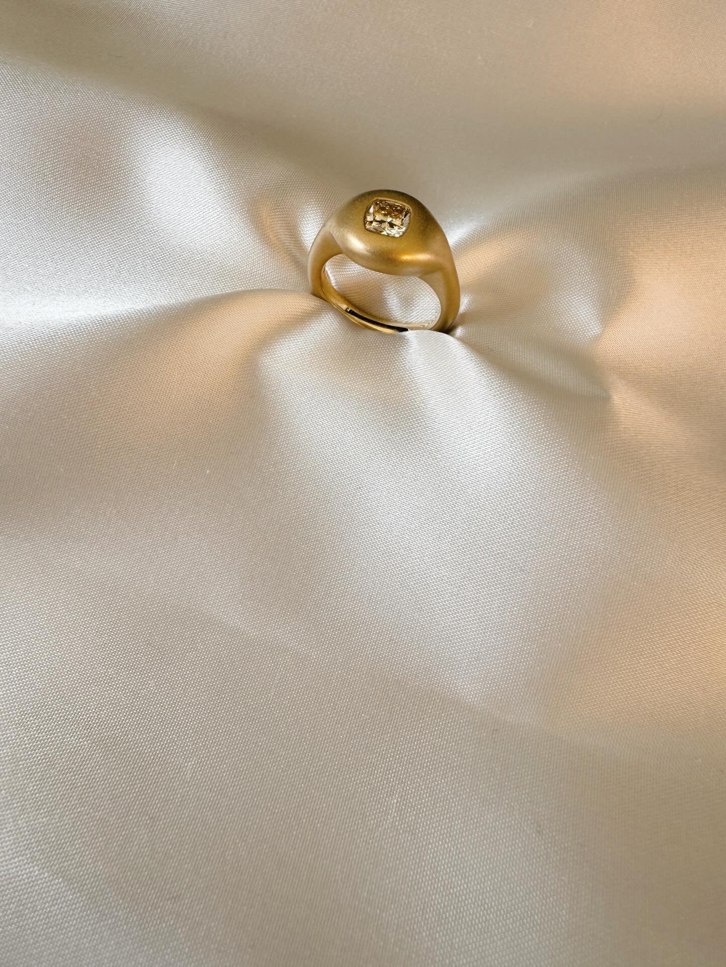 The ultimate touch-me-all-the-time ring. Inspired by ancient Roman jewellery and classic gypsy-style rings, the Bulb Ring was hand carved the old fashioned way, and finished with a flush set yellow diamond, giving it a deliciously solid, satisfyingly