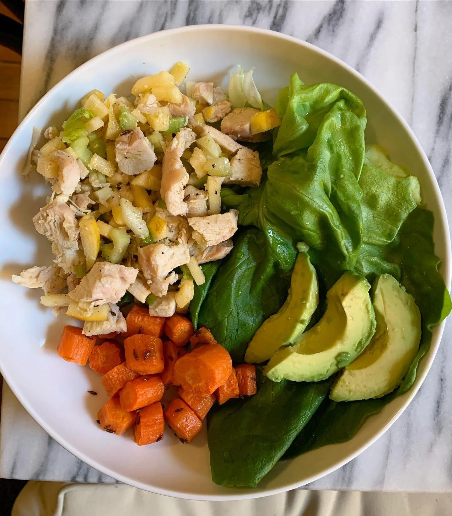 This chicken salad has been lunch on REPEAT the last three weeks. I love that it&rsquo;s so easy to make and I actually look forward to eating it (cause you know... lunch struggles.) I typically eat about a cup of it for lunch paired with some greens, roasted root veggies and 🥑

Key to making it filling is making sure you&rsquo;re eating enough (one cup = 30ish grams of protein) plus you can try pairing it with a healthy fat like avocado 🤙🏼

Recipe below👇🏼

1 lb organic chicken breast
3 stalks organic celery, chopped
1 organic opal apple, diced 
1/4 cup olive oil (or mayo)
1/2 teaspoon sea salt
1/2 teaspoon paprika 
Pepper to taste 

1. Bake the chicken at 350 for 45-55 minutes or boil chicken for 15 minutes until cooked.
2. While the chicken is cooking, chop the celery and apple. 
3. Once the chicken is cooked, chop and add it to a bowl. Add remaining ingredients and mix well. 

Store in an air tight container in the fridge for up to 5 days