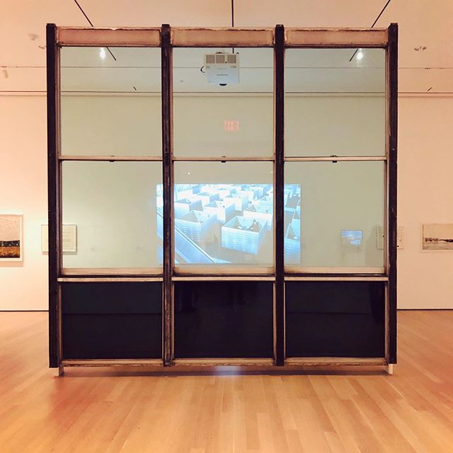 Current exhibit at MOMA showing Jacques Tati&rsquo; 1967 film, PlayTime juxtaposed thru a fragment of the original glass skin from the United Nations Building