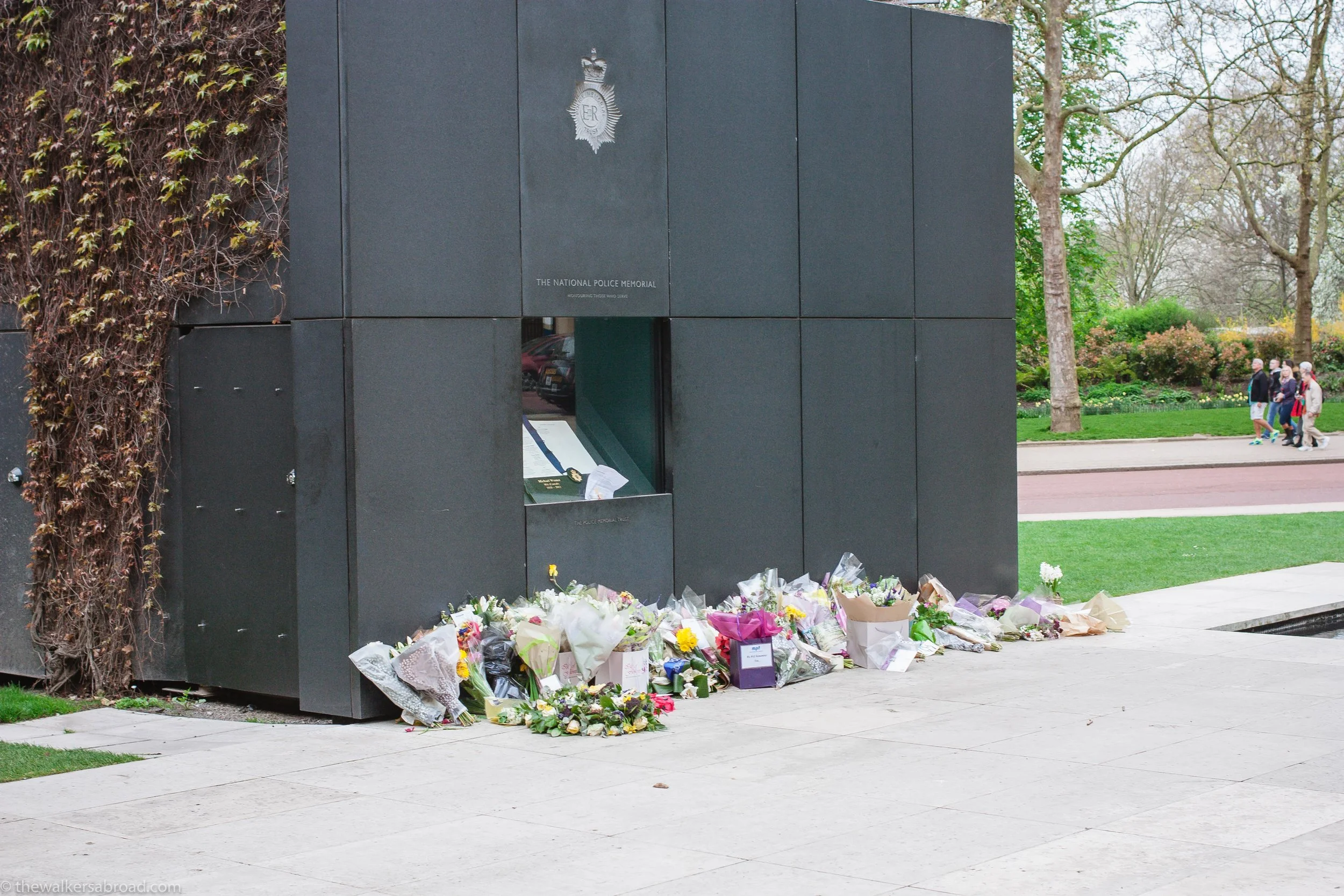 National Police Memorial. The book inside had the names inscribed of police officers who had lost their lives in the line of duty. The notes with the bouquets were so touching. 