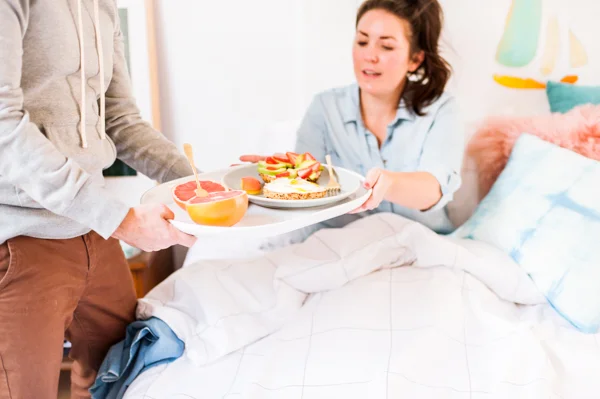 being-served-brekfast-in-bed-white-linens-1.jpg