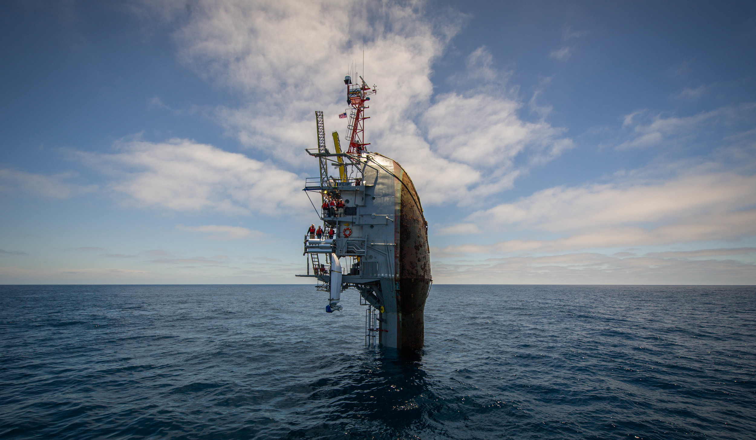   PACIFIC OCEAN  - Only 55 feet remain visible after the crew partially floods the Floating Instrument Platform, or FLIP's, ballast tanks causing the vessel to turn stern first into the ocean. The 355-foot research vessel, owned by the Office of Nava