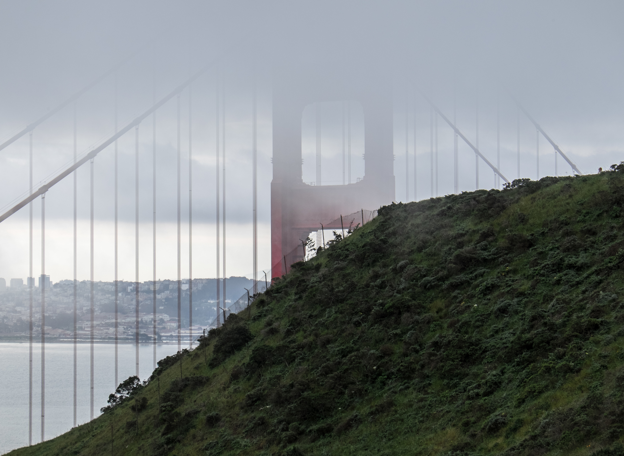 Among the first photographs I took of the bridge, was as I made the short climb at Battery Spencer which puts you at eye level with the bridge towers and in this case almost in the clouds. 1/60 @ f10, ISO 400.