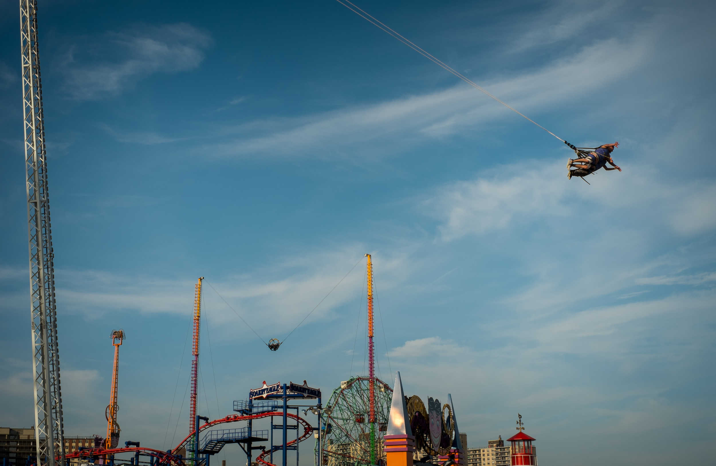 I used continuous shooting (burst mode) set to six frames per second (max for this camera) to capture this photo in Coney Island. 1/300, f11 at ISO 200.