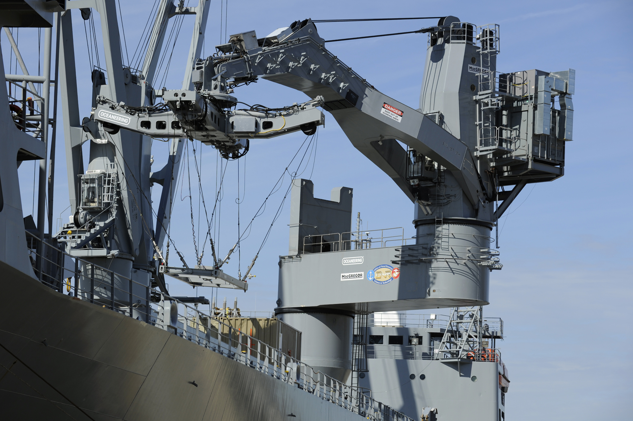   NORFOLK, Va. &nbsp;- The Large Vessel Interface Lift-on/Lift-off (LVI Lo/Lo) crane, funded by the Office of Naval Research, demonstrates container transfers pier side using a roll simulator aboard the Military Sealift Command auxiliary crane ship U