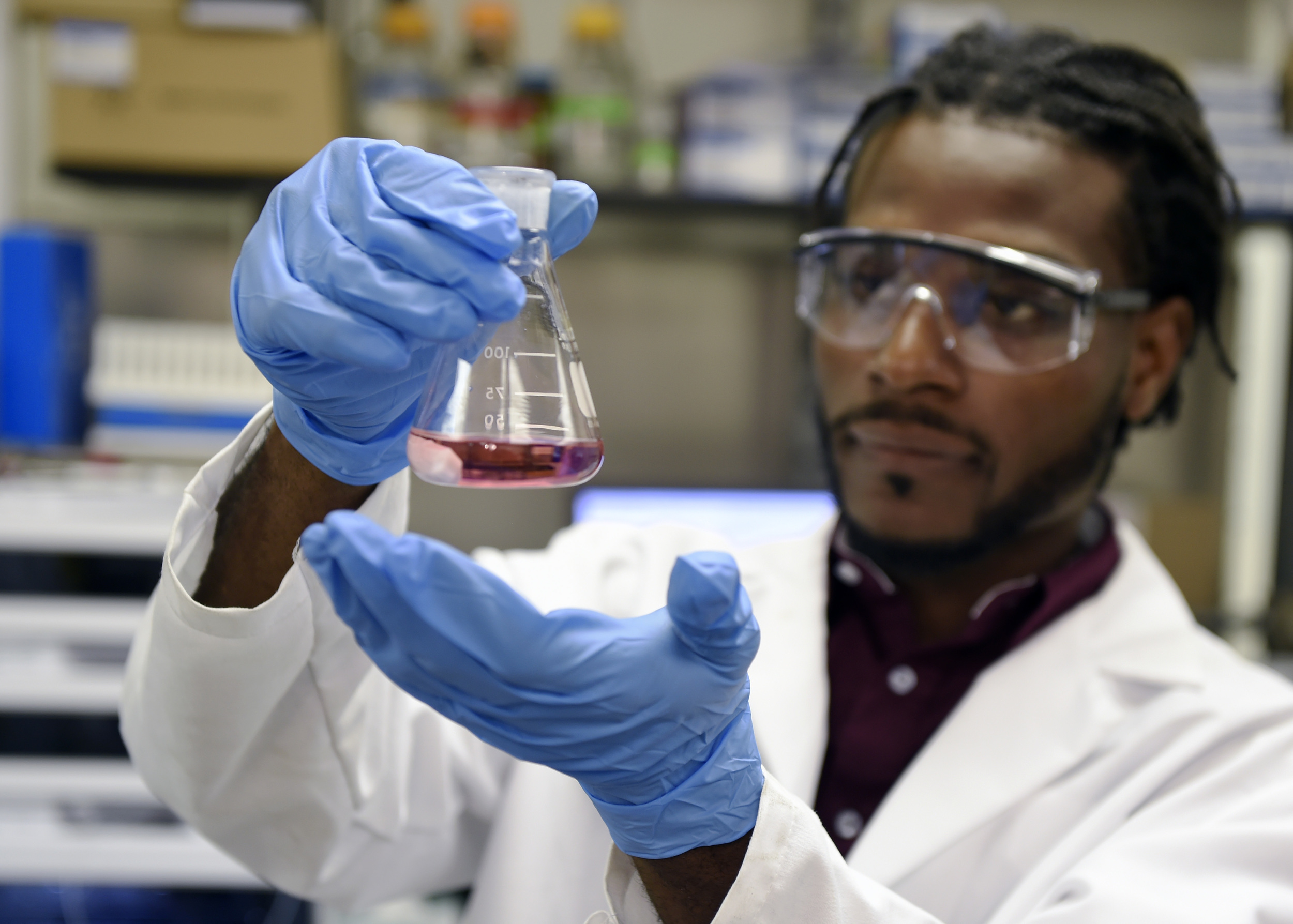   Washington, D.C.  - Morgan State physics major Derick Buckles works in the lab during a 10-week internship at the Naval Research Laboratory in Washington, D.C., part of a summer research program administered by the Department of the Navy's Historic