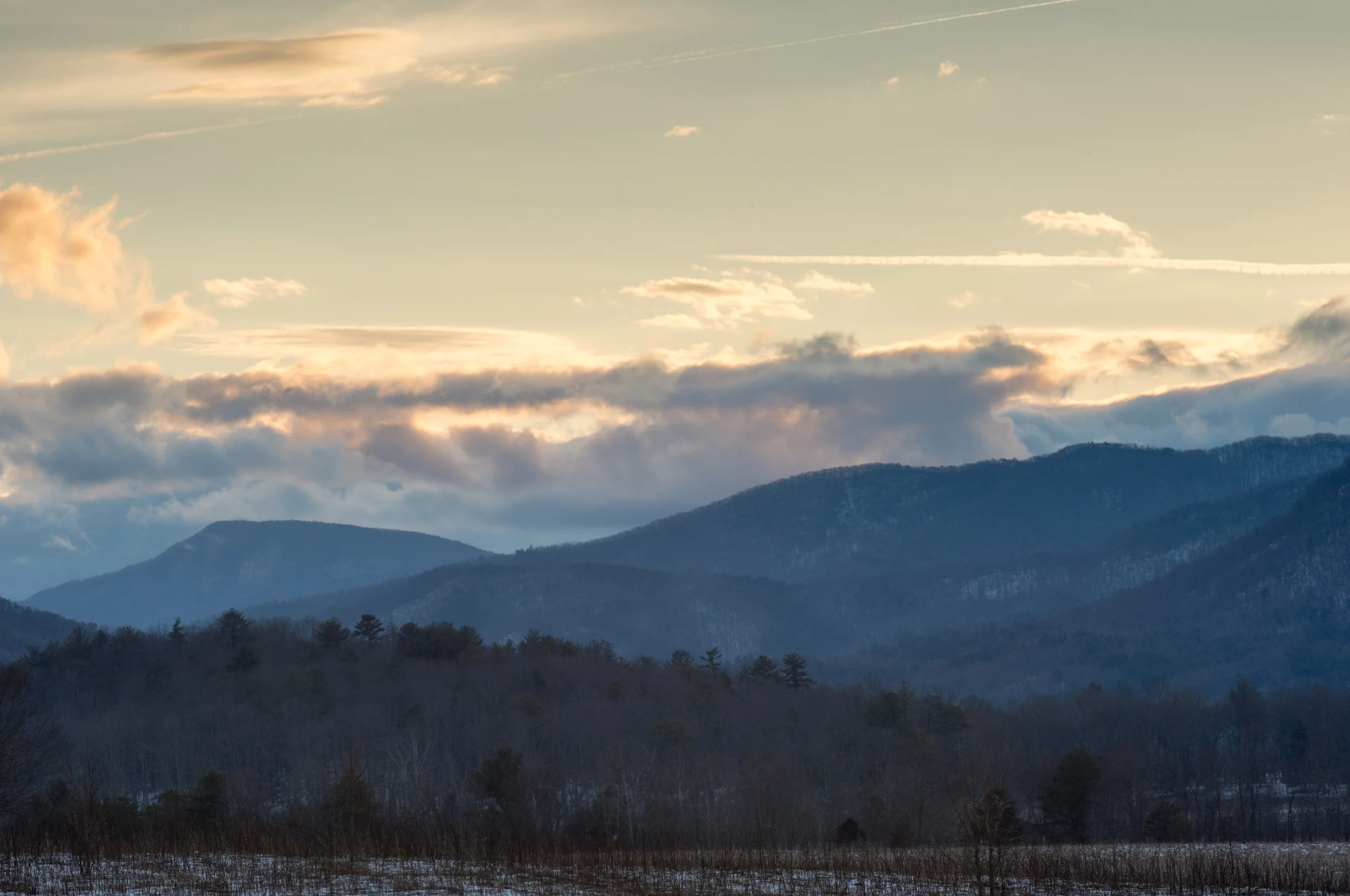 Low clouds backlit by the rising sun. 1/50 @f22, ISO 400.