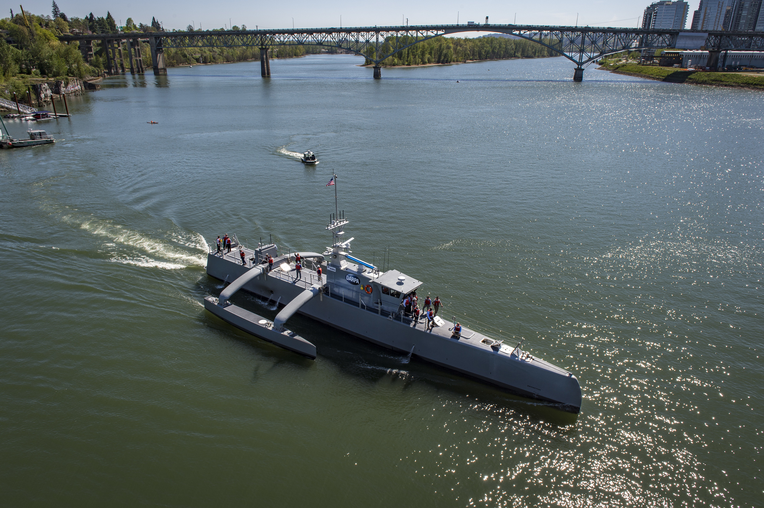  PORTLAND, Oregon - Sea Hunter, an entirely new class of unmanned ocean-going vessel gets underway on the Williammette River following a christening ceremony in Portland, Oregon. Part the of the Defense Advanced Research Projects Agency (DARPA)'s Ant