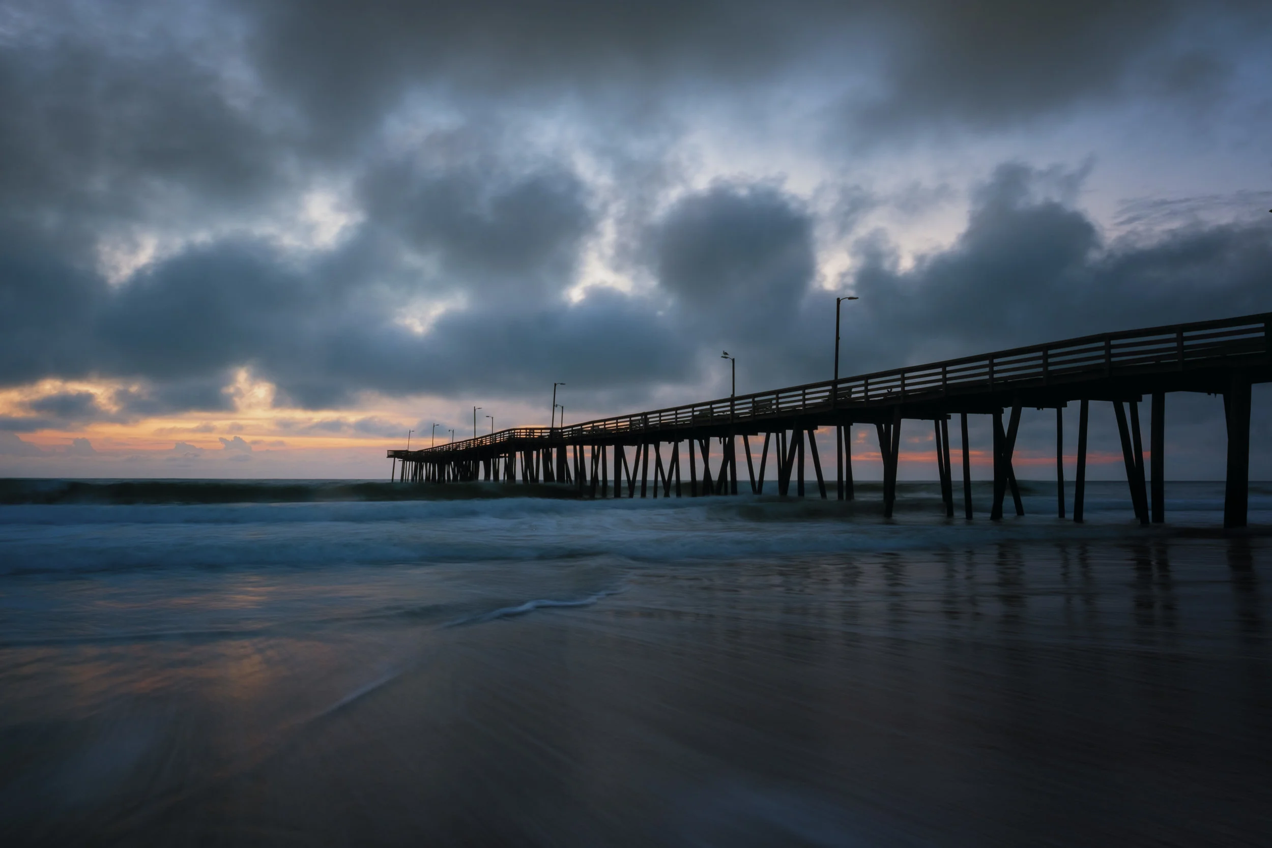 With sunrise or sunset photos, I like to have a foreground element. In this case, I used the pier which helps lead you into the photograph. The sun provides some backlight at the end of the pier and adds a subtle warmth overall without overpowering the photograph. Finally, I used a slow shutter speed to smooth out the surf, which further draws you in. Fujifilm X-Pro2 with 16mm, 1 second @ f16, ISO 200.