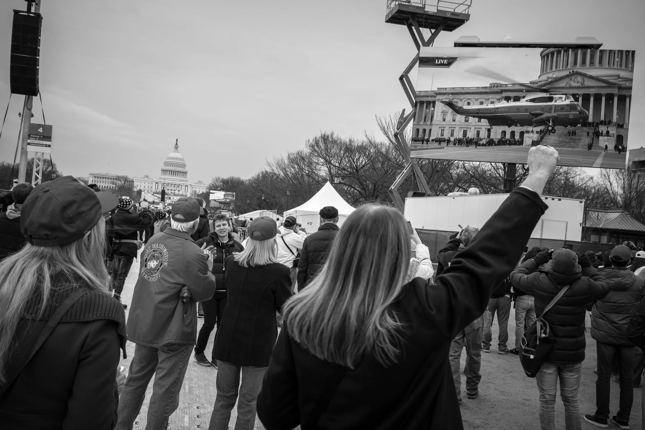 The final photograph I made that day was of Barack and Michelle Obama leaving D.C. aboard Marine One. Once again I was looking for crowd reaction to the scene happening on the big screen. Although there is some disagreement, my opinion is the crowds weren't as big as in 2009, but this is the kind of situation, crowds, fast-moving and with plenty of action, that I like, and the 23mm was the perfect one lens for me that day. Fujifilm X-Pro2 with a Fujinon XF 23mm f2 R WR, 1/200 @ f6.4, ISO 200.