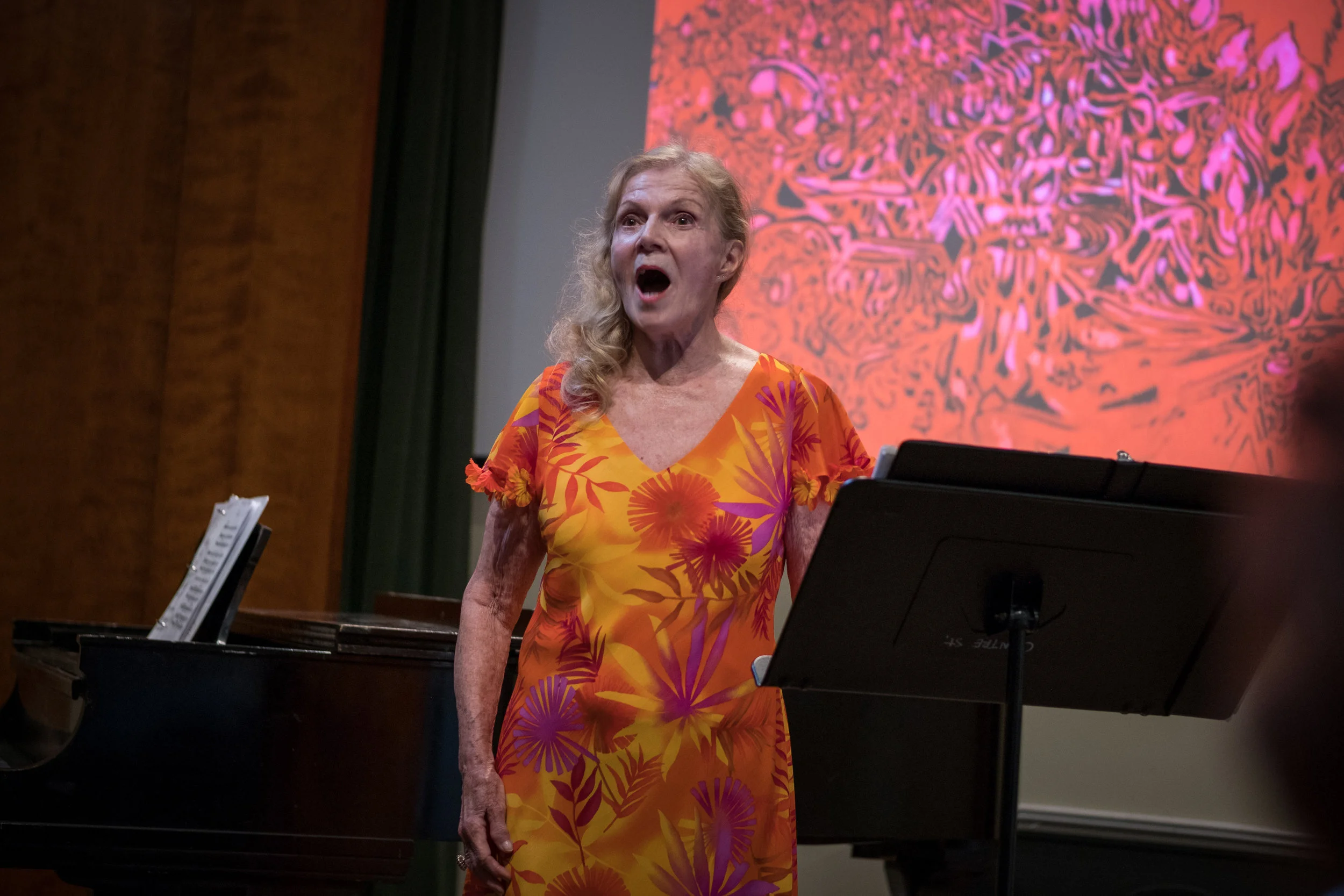 I took these photos from my seat while the event's official photographer, with two Nikon D5 cameras, who was sitting right in front of me could only watch. The soloist never knew I was taking these pictures. Fujifilm X-Pro2 with a Fujinon 50mm, f2. 1/160 @ f2, ISO 800.