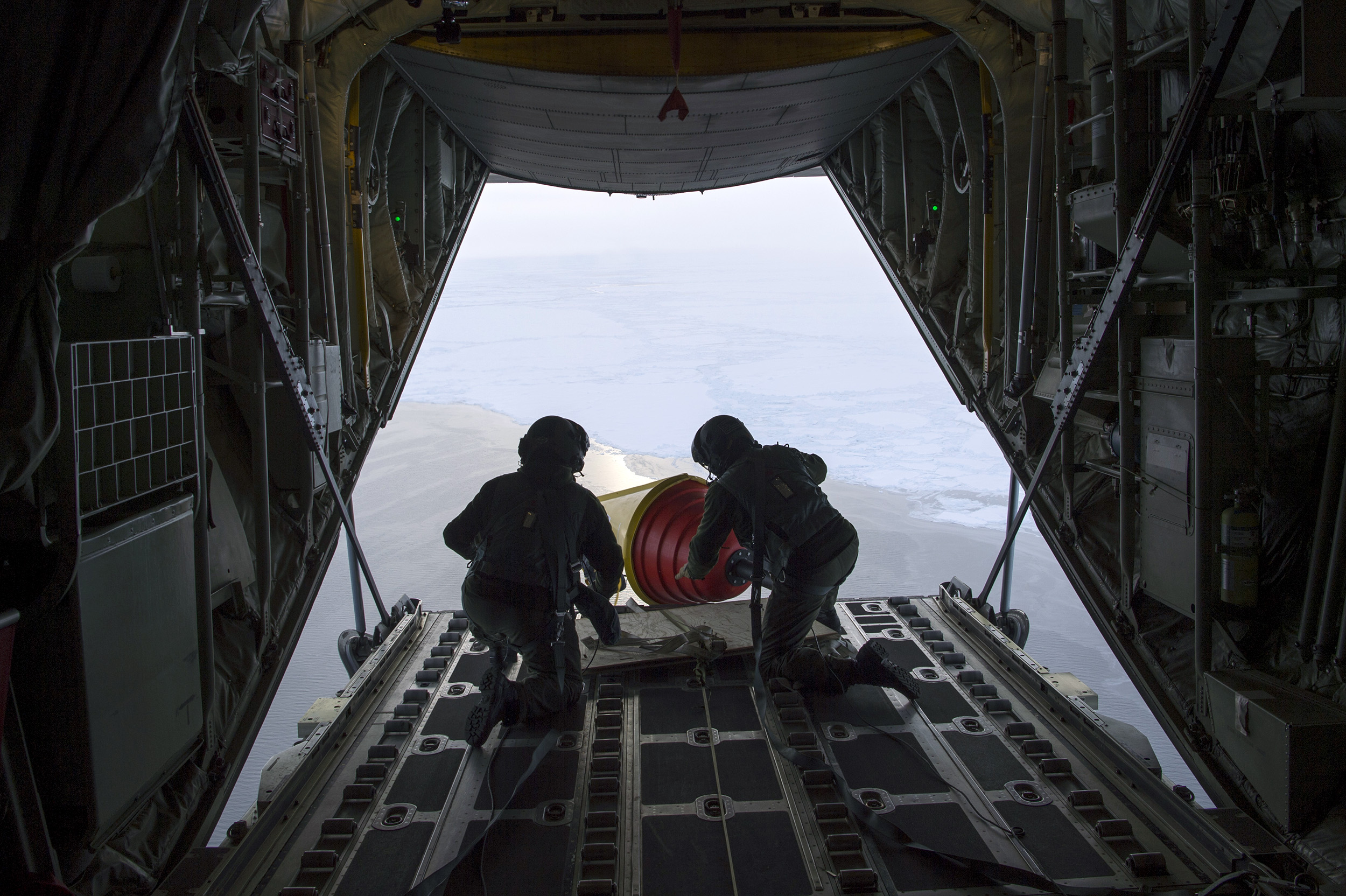   ARCTIC OCEAN  - An Air-Deployable Expendable Ice Buoy (AXIB) is deployed in the high Arctic near the North Pole from a Royal Danish Air Force C-130 aircraft operating out of Thule Air Force Base in Greenland, as part of the International Arctic Buo