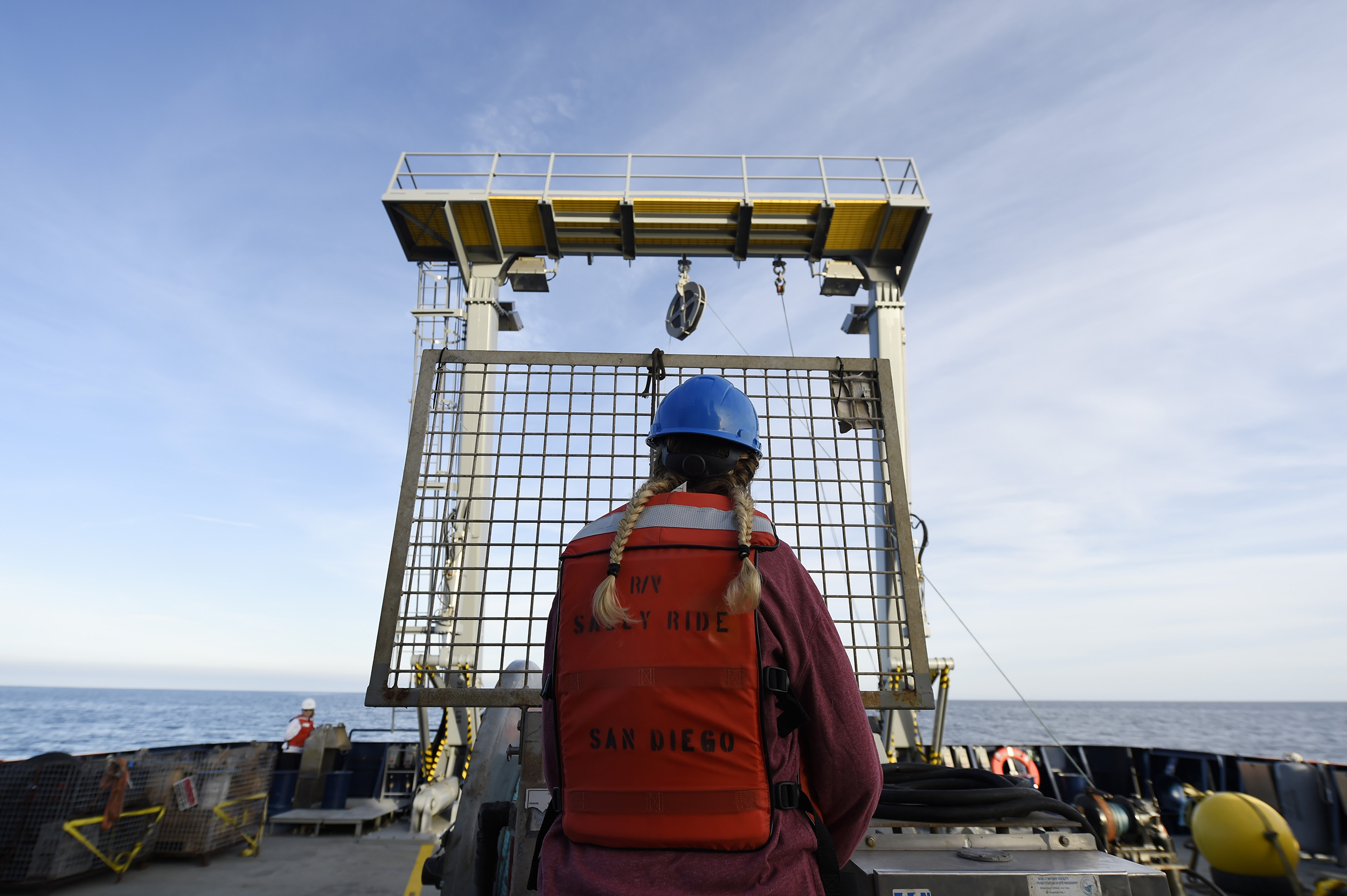  PACIFIC OCEAN - Sara Goheen, an engineer with Scripps Institution of Oceanography, operates a crane aboard the Auxiliary General Oceanographic Research (AGOR) vessel R/V Sally Ride during the retrieval of scientific equipment as part of a science ve