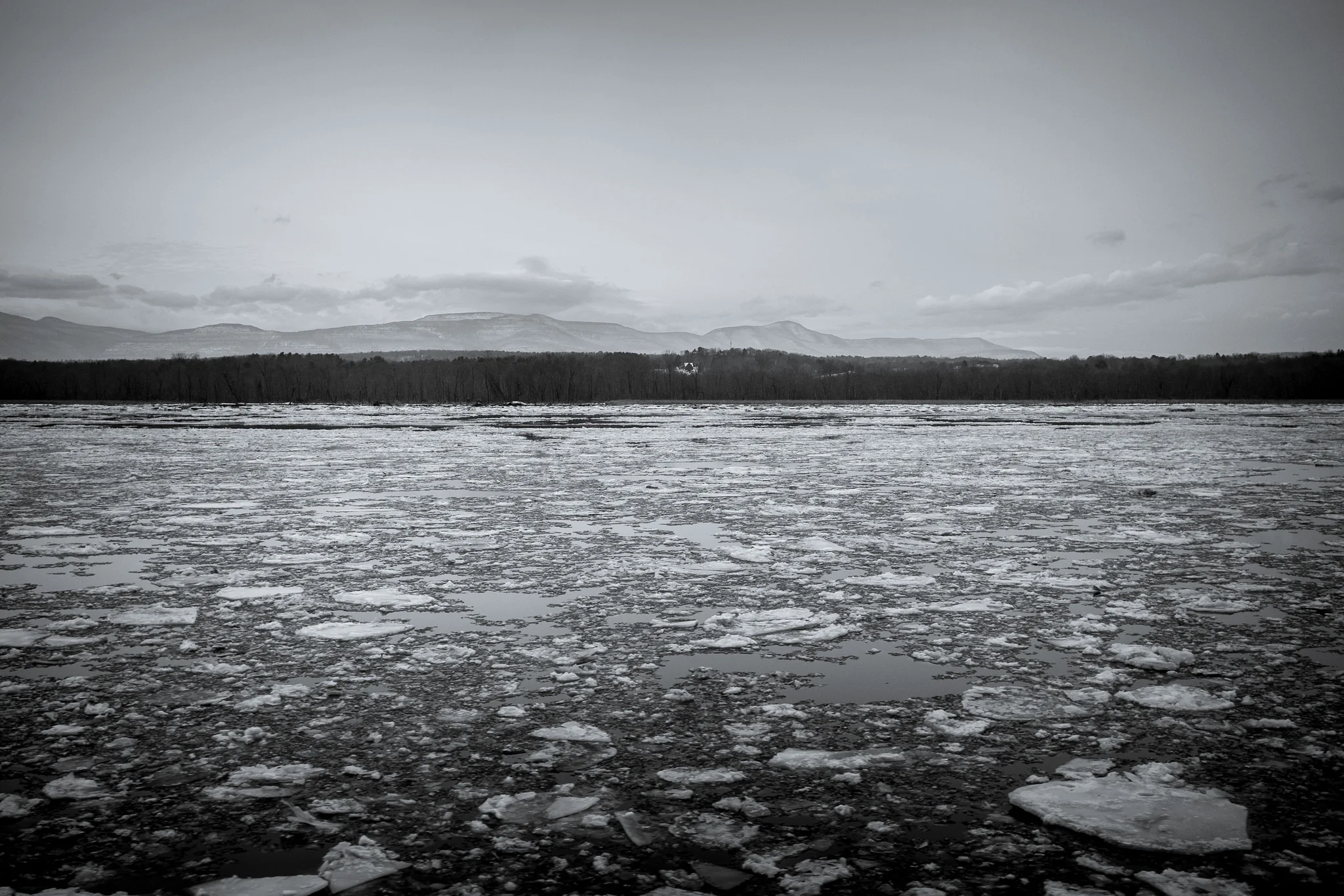I selected the left side of the Amtrak Adirondack train from New York to Montreal because I knew the Hudson River would be out my window during most of the trip. The ice was a bonus. Fujifilm X100S, 1/1250 @ f2.8, ISO 400.