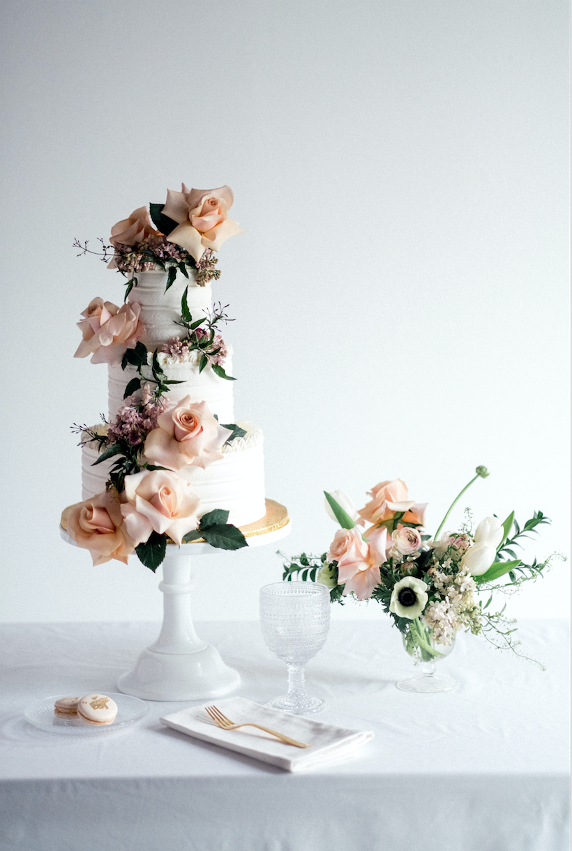 White wedding cake with roses