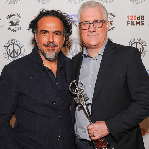 Alejandro G Iñárritu presented the Trailblazer Award to David Linde , CEO of Participant Media . Photo by Laura Revercomb