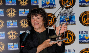 Michael Lang accepts 2011 Spirit of Woodstock Award