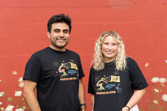 Staff member Jason Vasquez and intern Chase Mayo modeling the new shirt designs