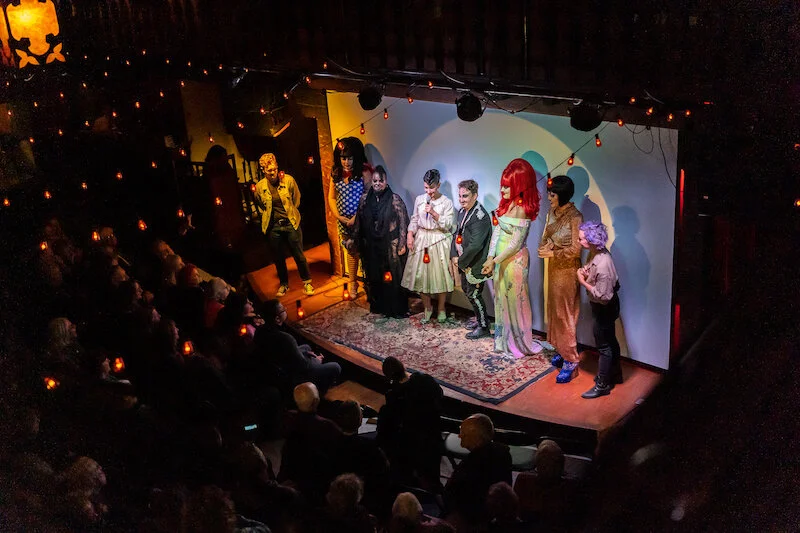 A Night at Switch n’ Play director Cody Stickels (left) with the Switch n’ Play crew onstage at The Colony