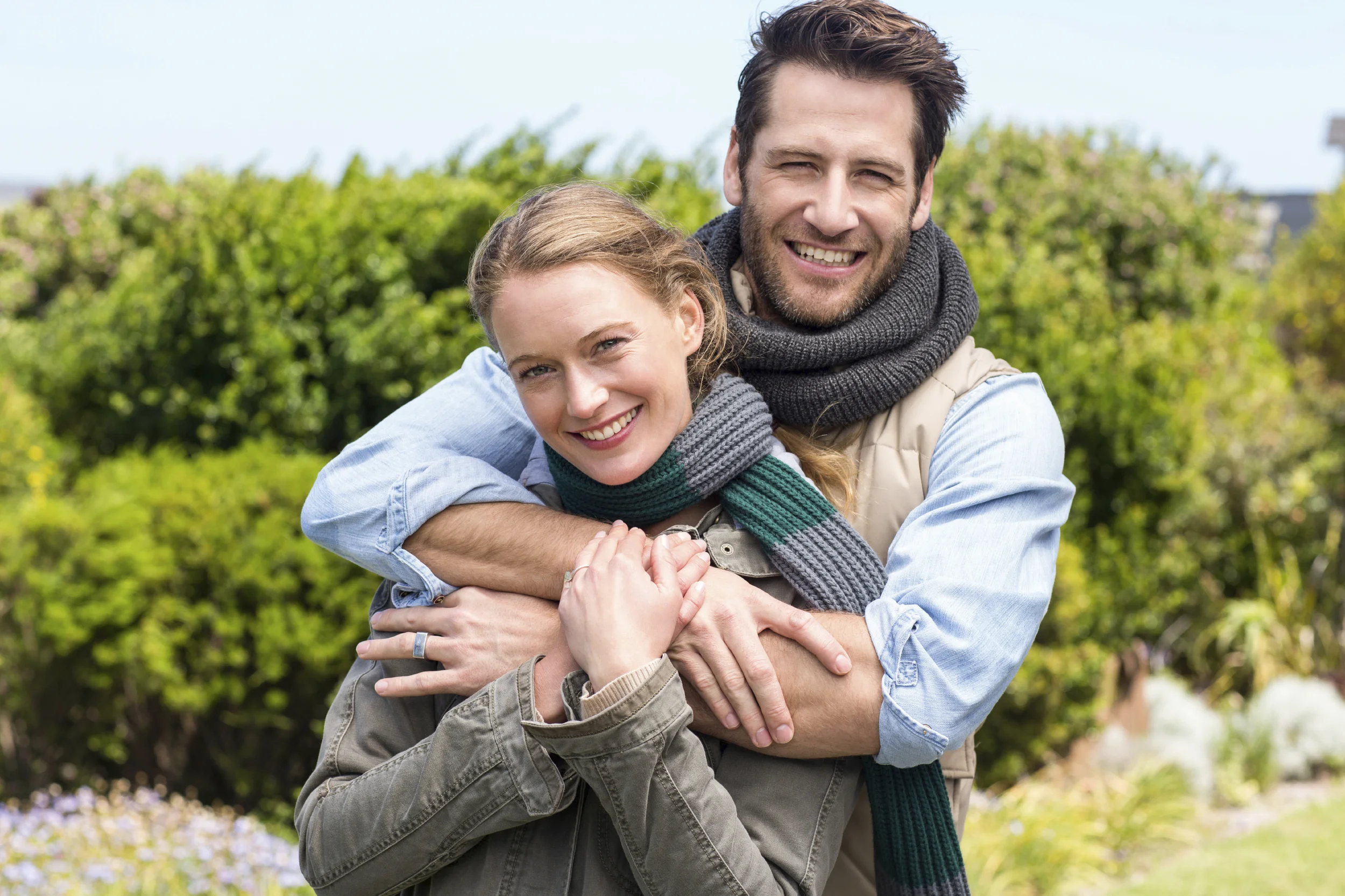 Smiling couple hugging