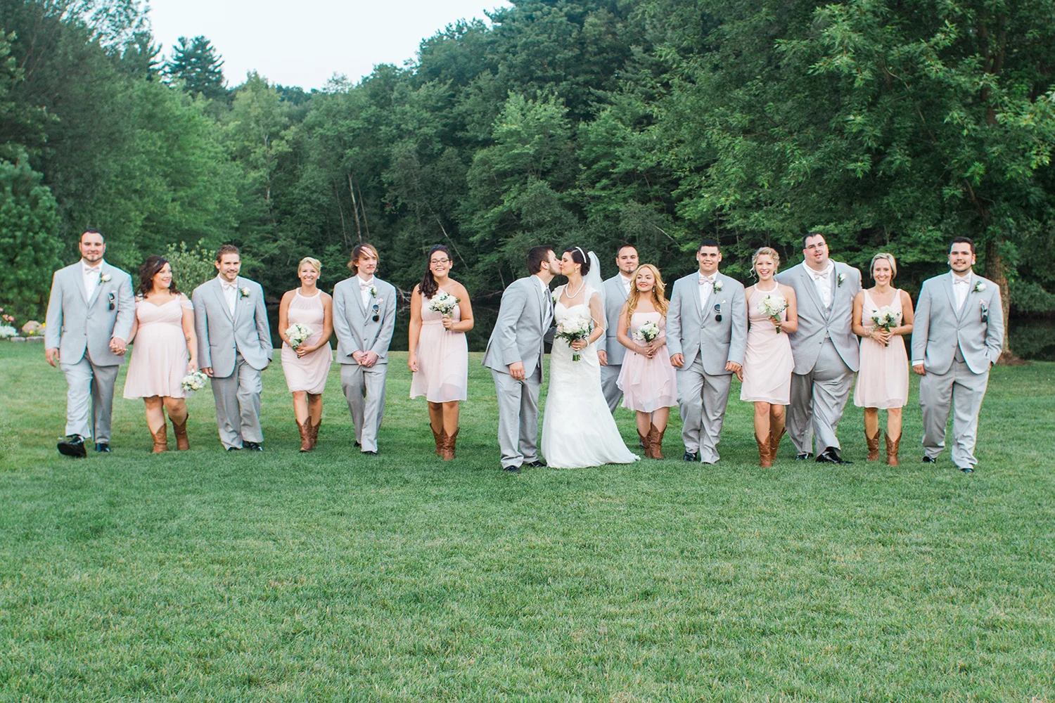 bridal_party_walking_kiss.jpg