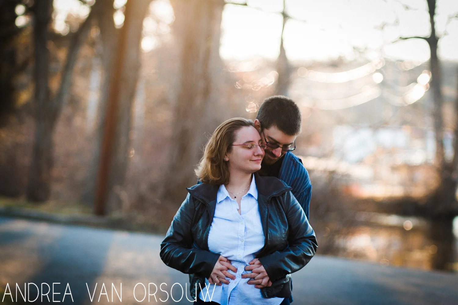 couple_hugging_at_sunset_glasses_winter.jpg