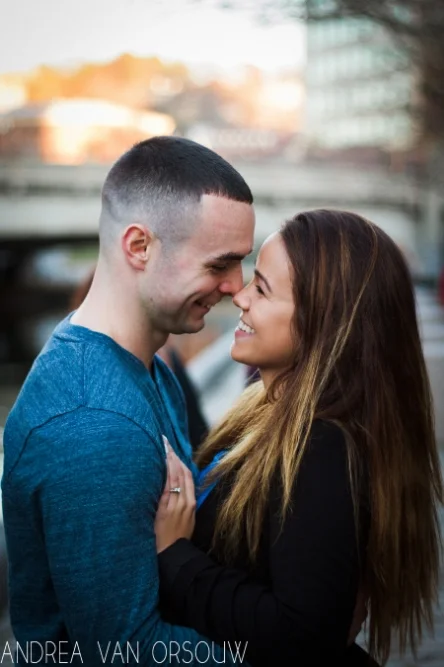 laughing_close_engaged_couple_blue_sunset_city_park_providence.jpg