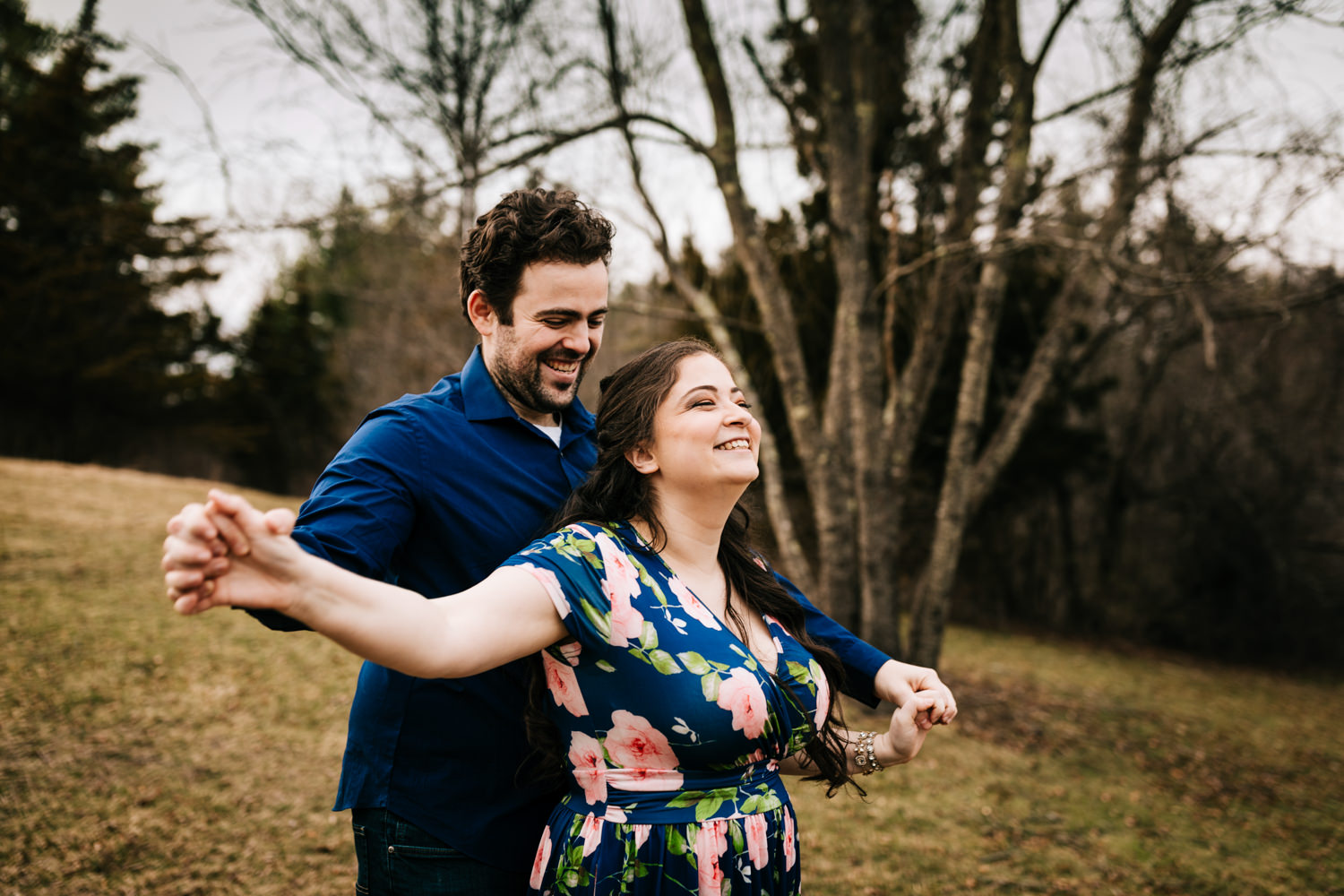 Couple having fun during photoshoot in wildlife sanctuary in Massachusetts