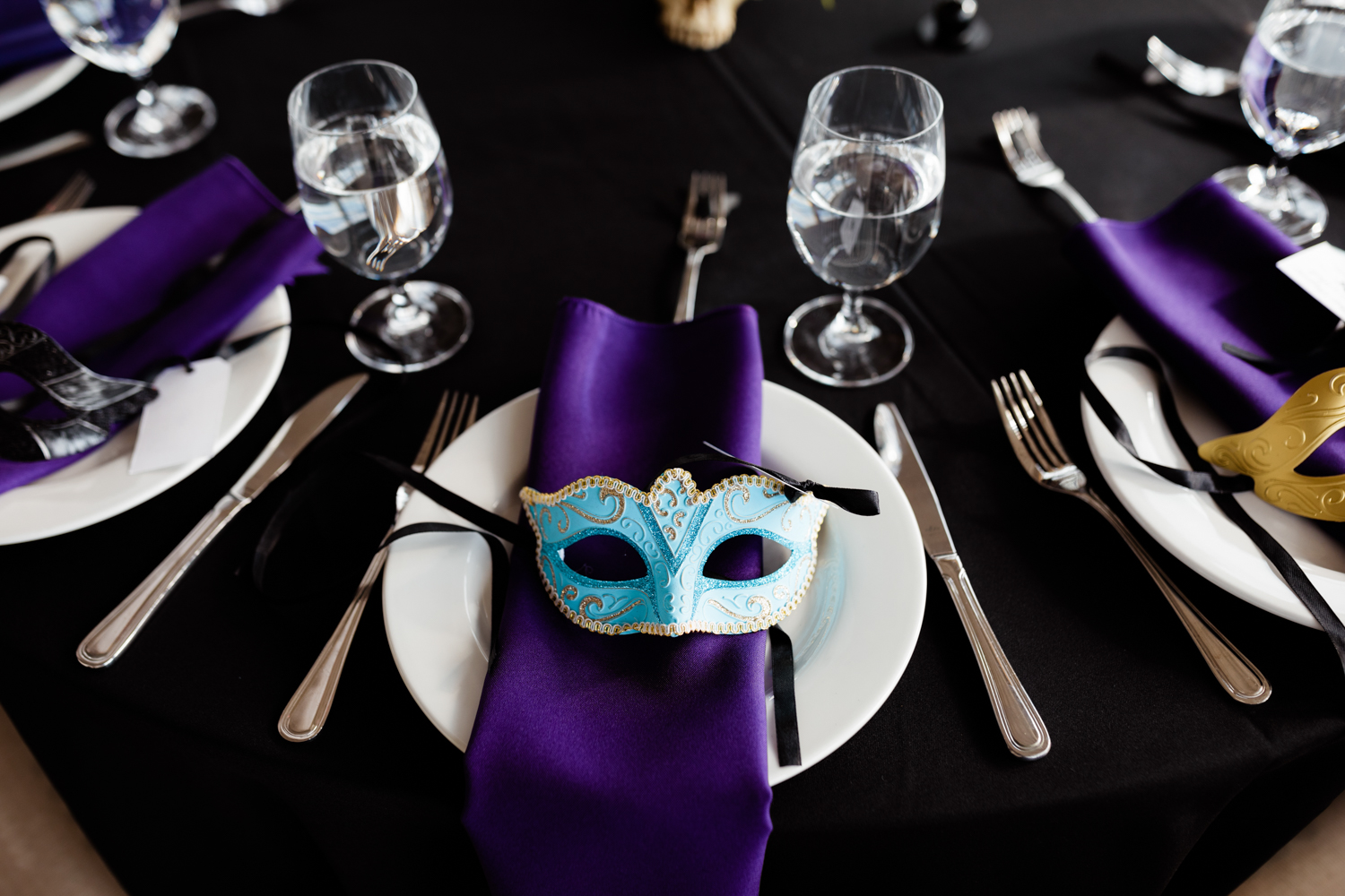 Masquerade themed wedding wedding table plate set up