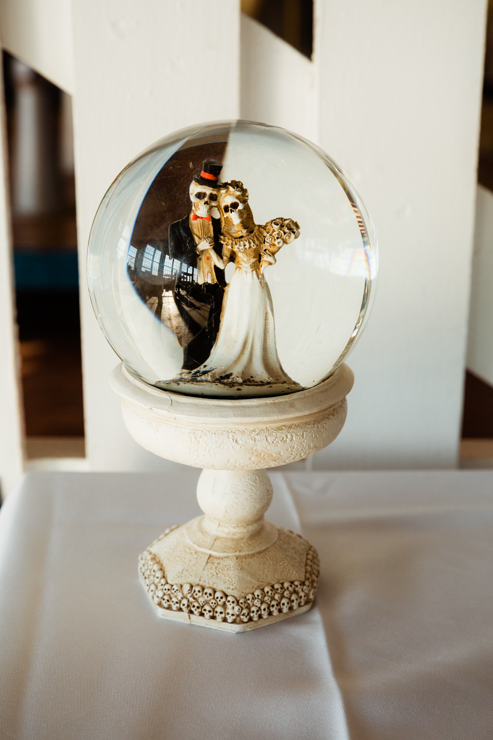 Day of the dead and halloween themed wedding snow globe