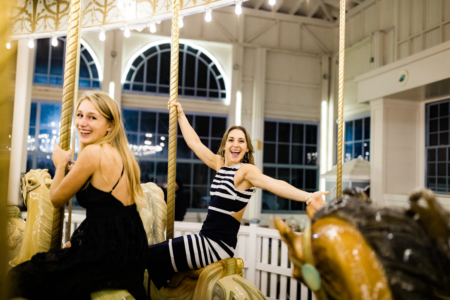 Wedding guests having fun on carousel