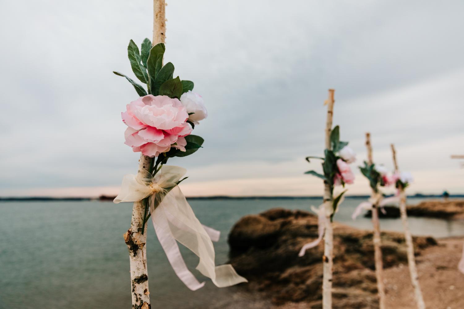 Pink roses for intimate beach wedding