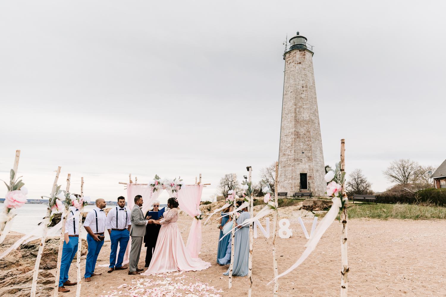 Beach ceremony set up with floral decorations