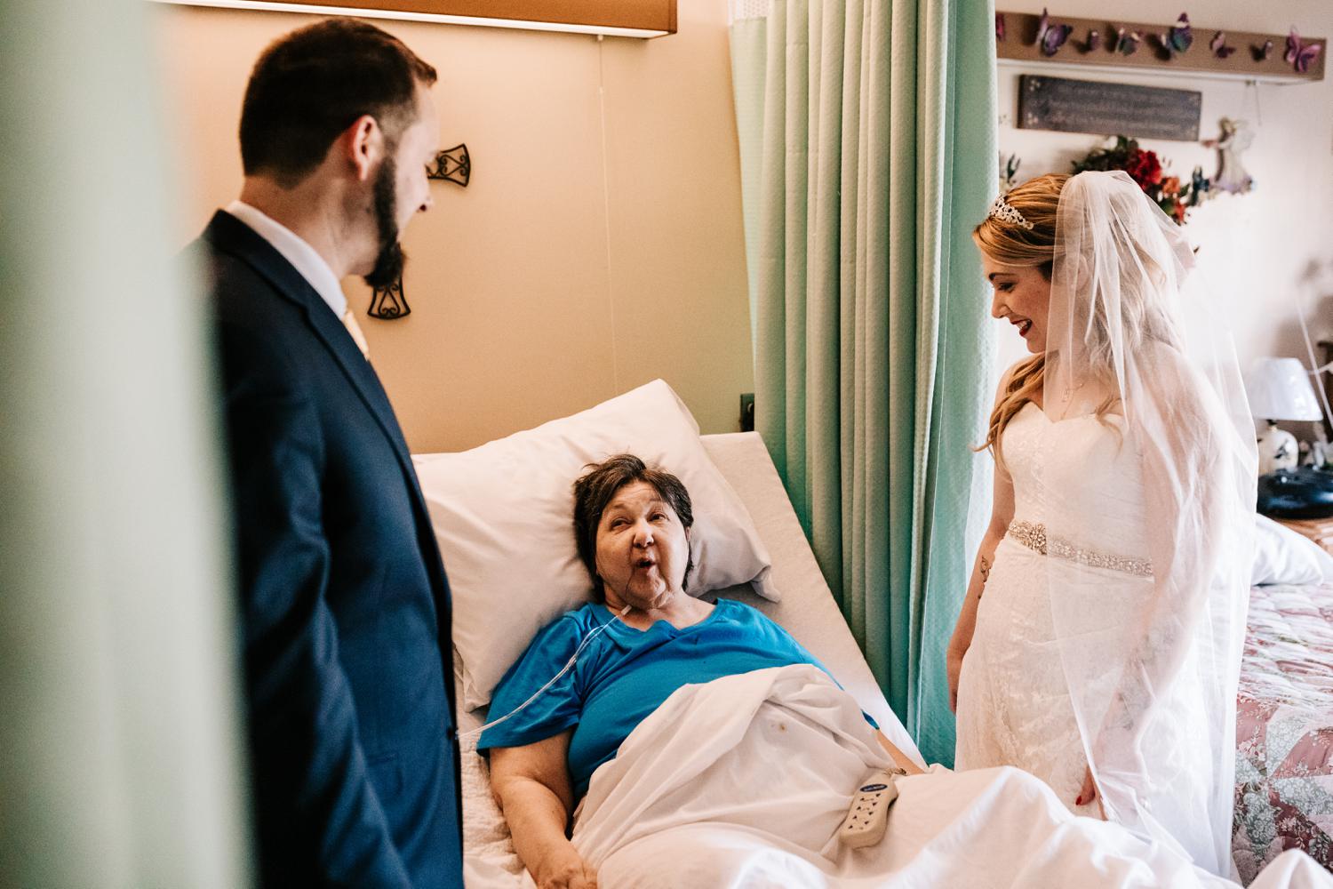 Bride and groom visiting grandmother in nursing home