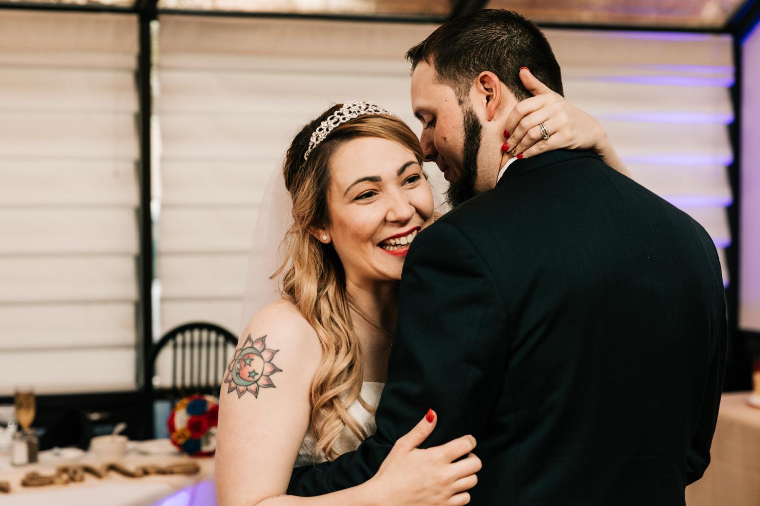 Tattooed bride and groom's first dance