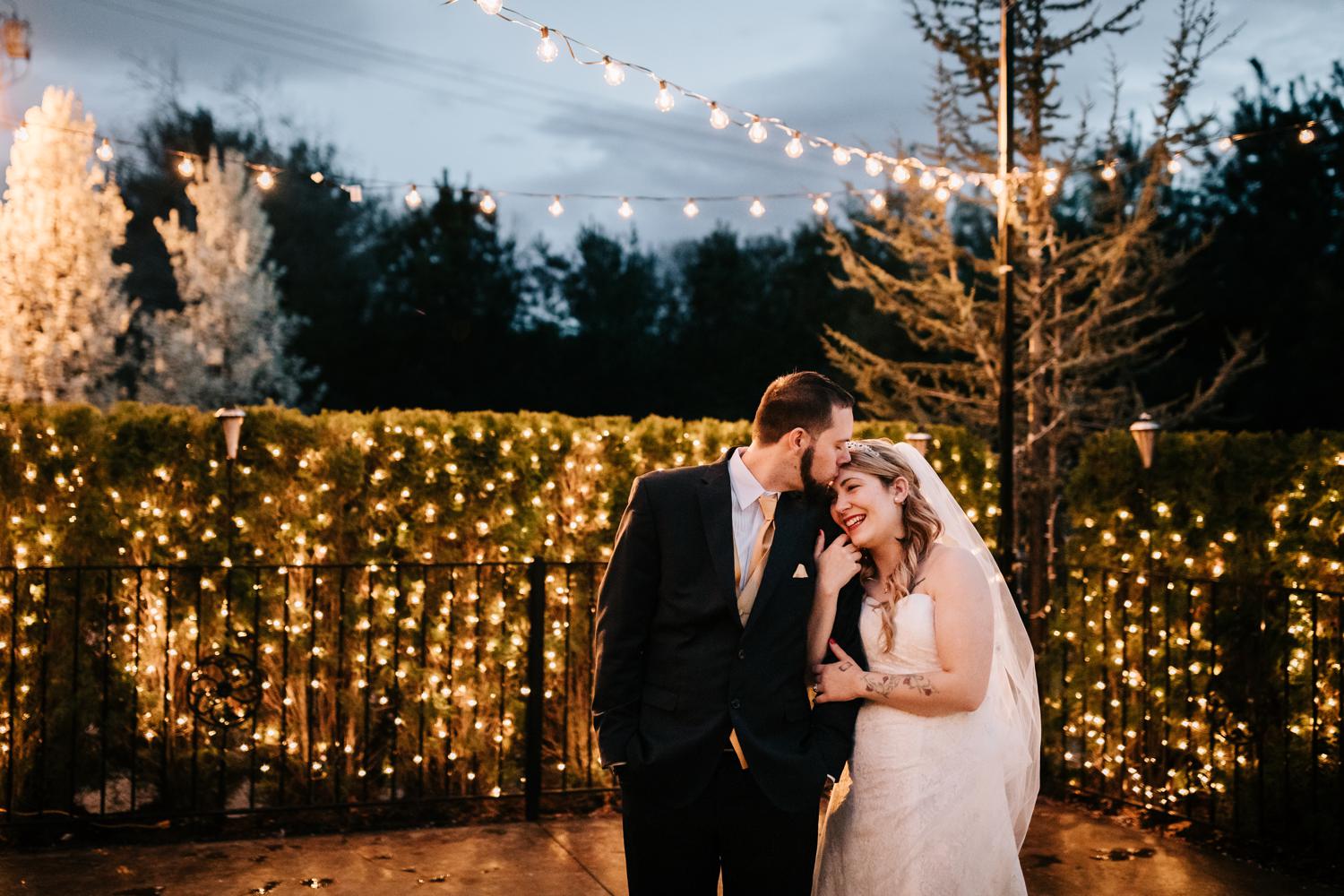 Bride and groom quality time outside at night