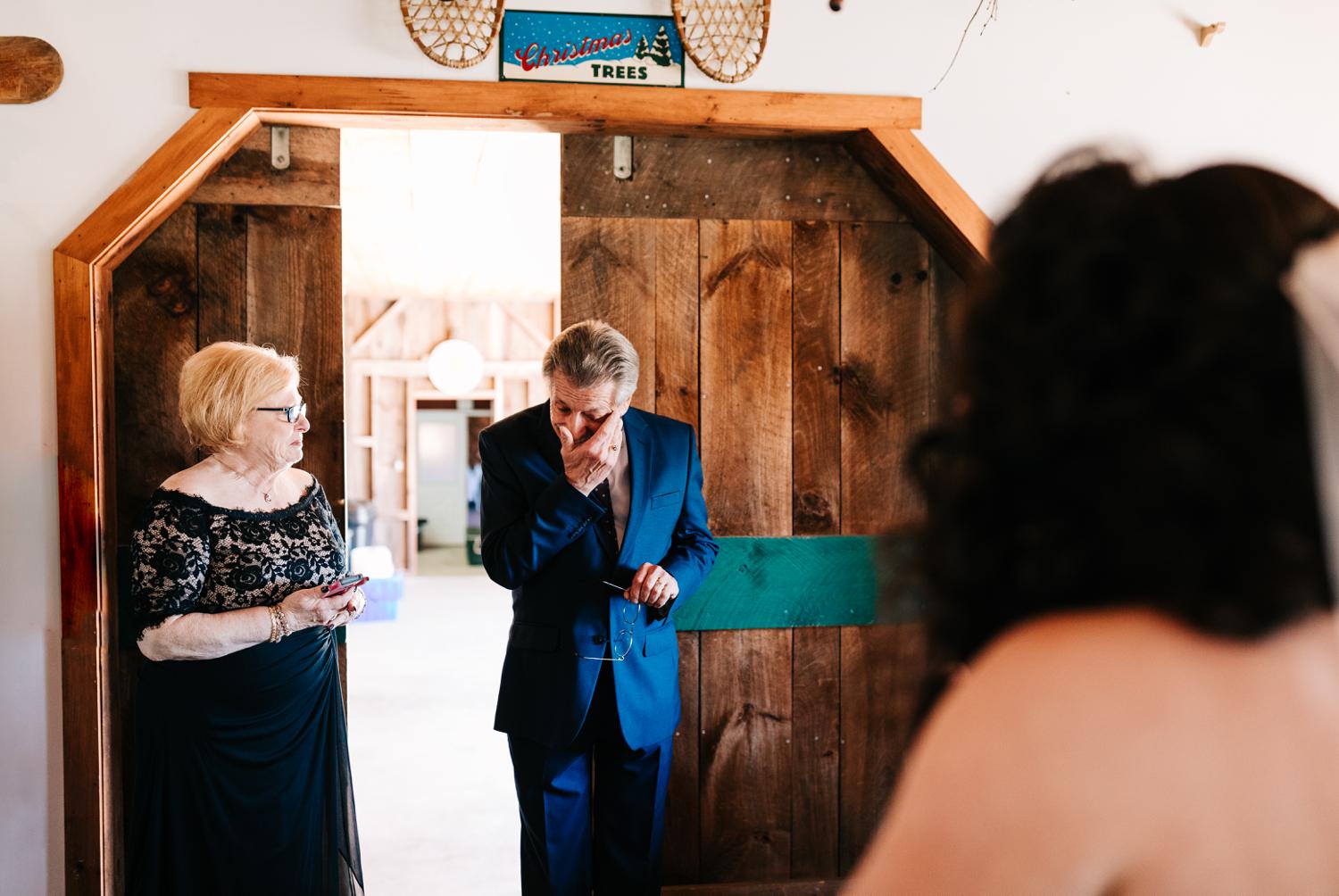 Father reacting to daughter as a bride for first look in Albuquerque