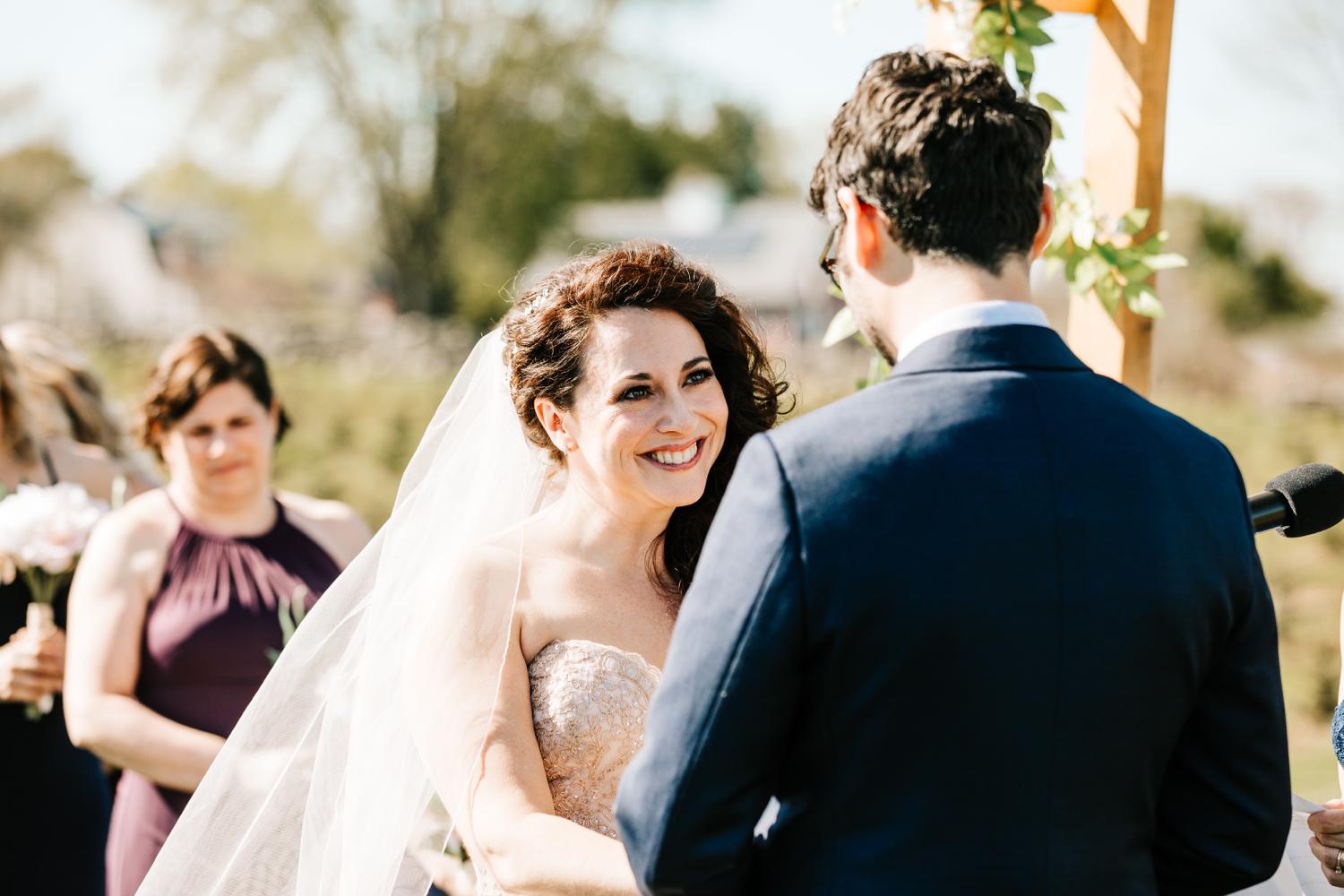 Bride looking at groom during wedding ceremony in El Paso