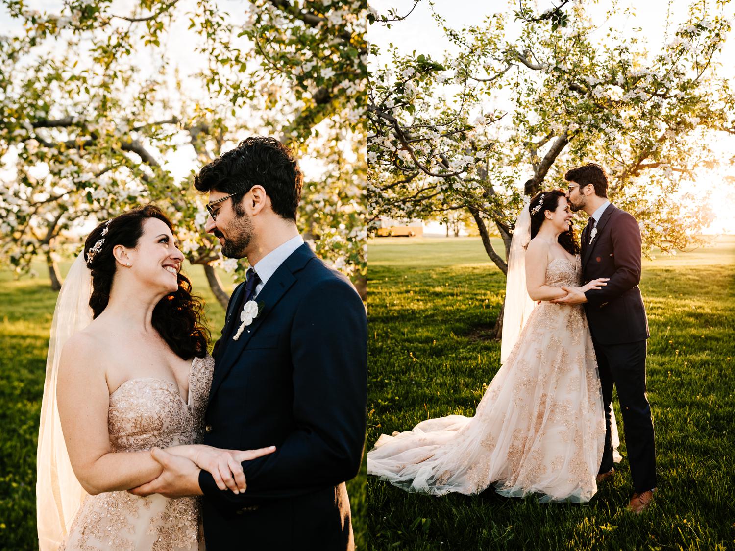 Bride and groom being intimate in tree field in Lubbock