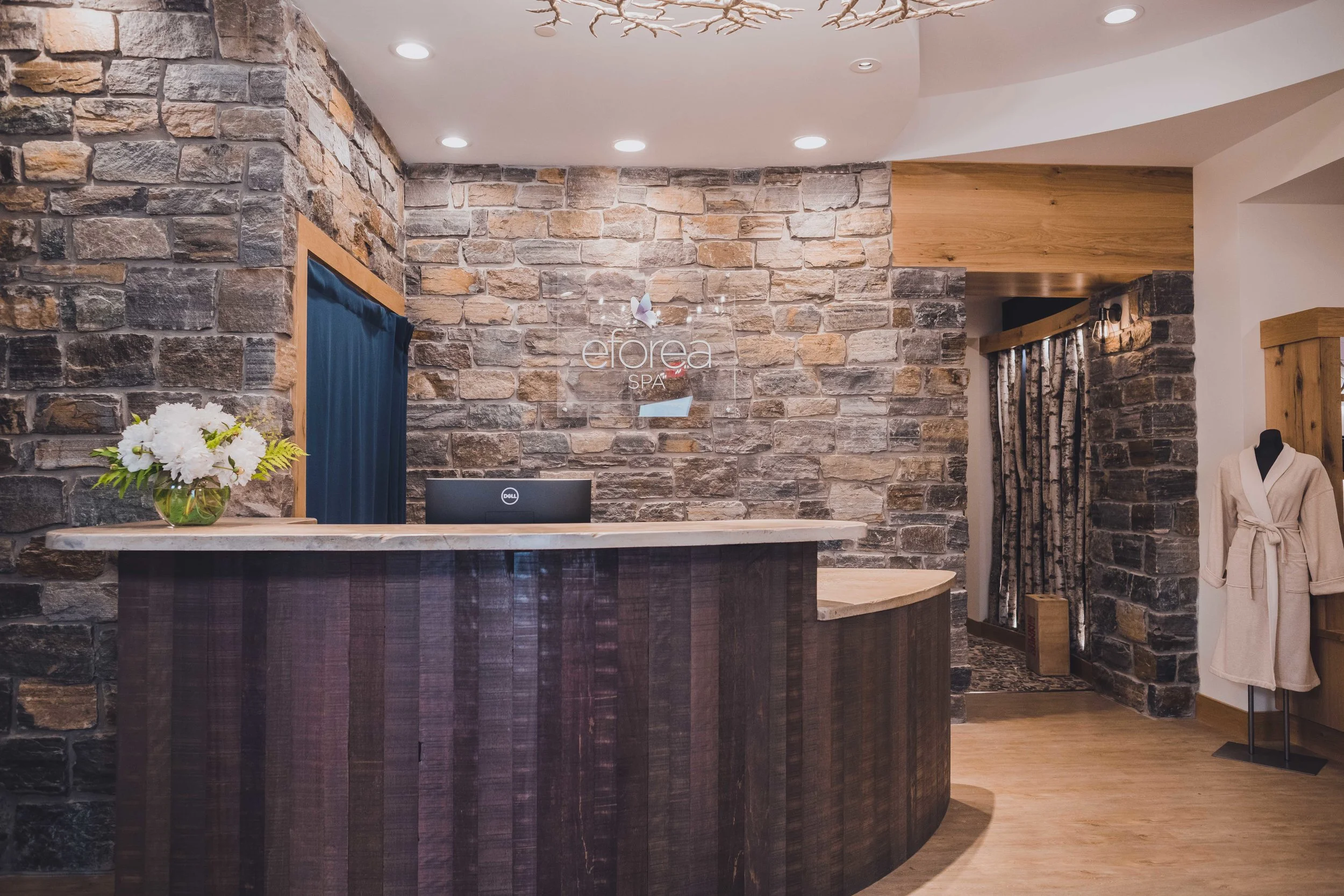 The modern rustic design of the Tailwater Lodge front desk