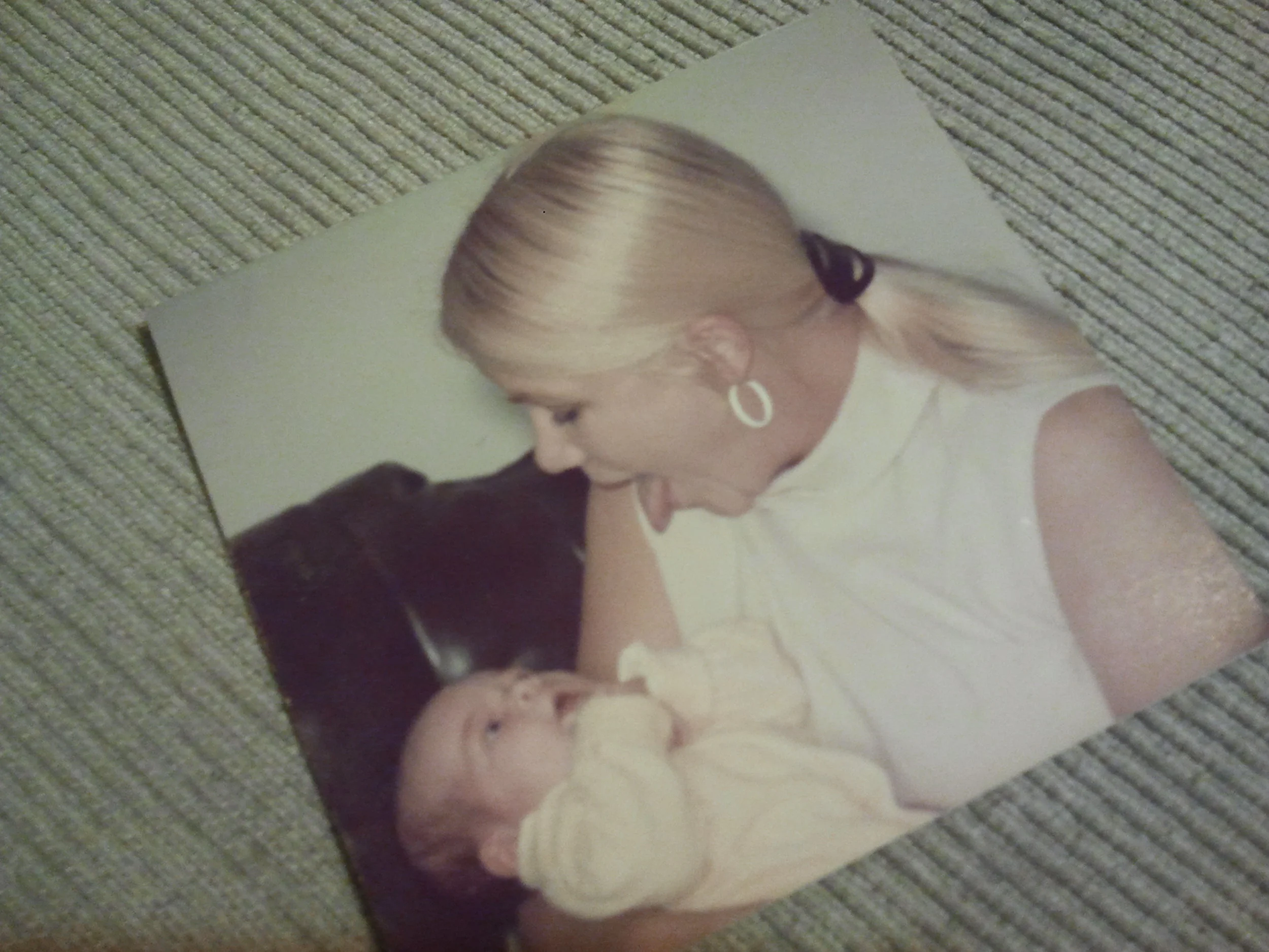 Baby Diana with her adoptive mother on the day she was officially adopted.