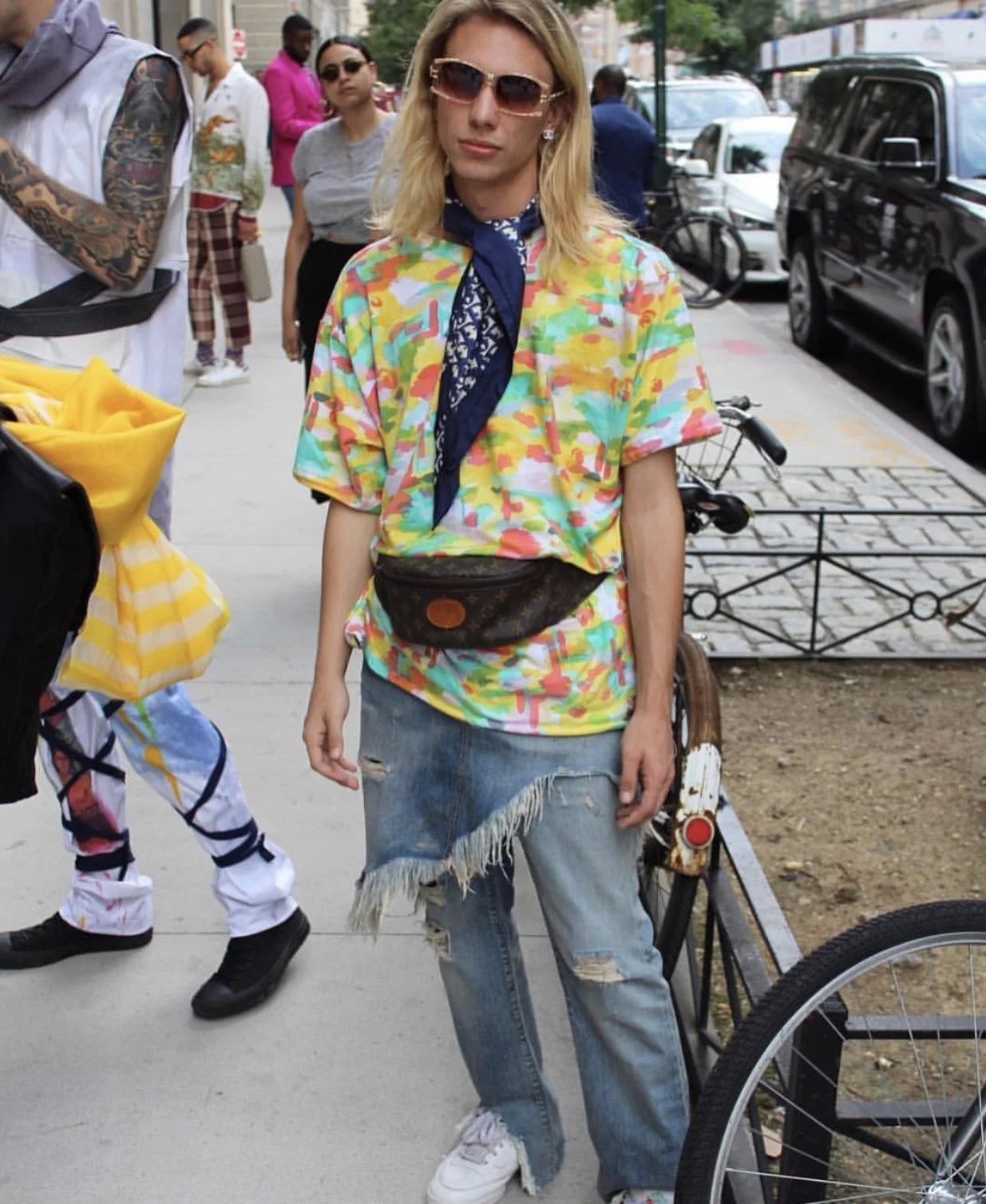 Christopher Di Giorgio wearing a tie dye camoflauge t-shirt from his SS18 collection during NYFWM in July. 