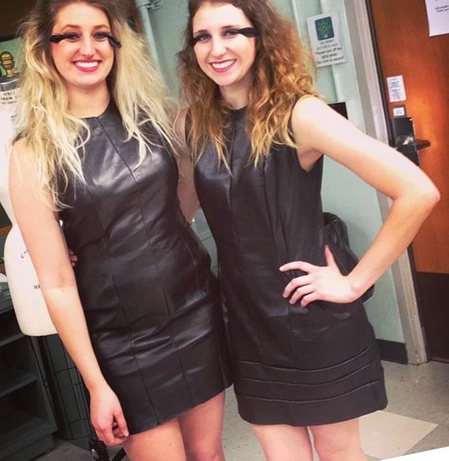 Courtney and her sister modeling pieces from her senior collection entitled Wild, which featured leather dresses.