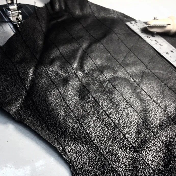 A detail shot of quilted shoulder pieces for one of the jackets in Courtney's upcoming collection.