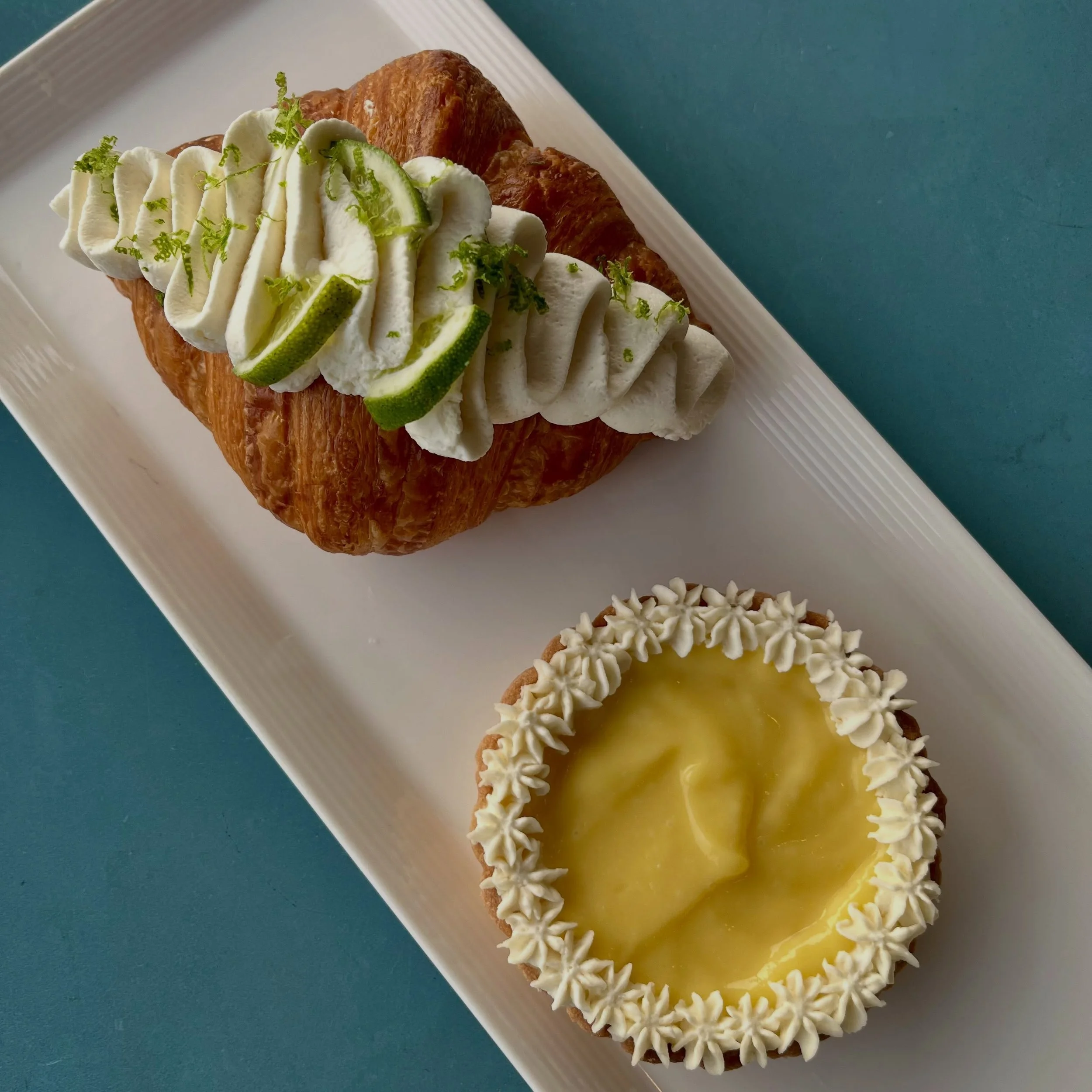 A perfect match ✨🥐🌞🍋&zwj;🟩

We decided to give our August monthly croissant a buddy: our Keylime Tart. Our Keylime tart is filled with a fresh, zingy lime curd and topped with fresh whipped cream flowers 🍋&zwj;🟩✨

When you stop in to grab our K