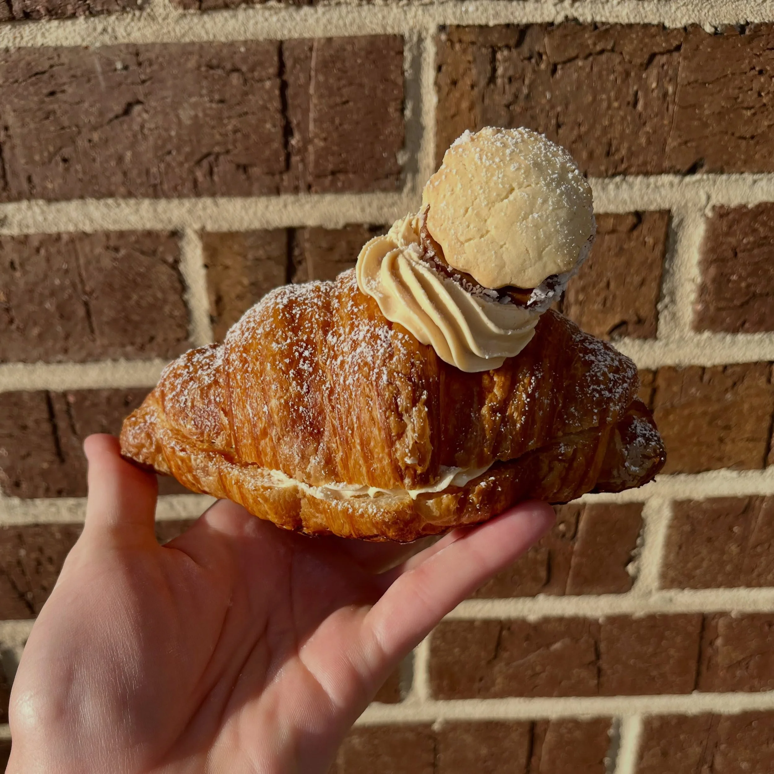 Introducing the special croissant for the rest of September, our Dulce De Leche Croissant! 

These stunning pastries are filled with rich Dulce de leche spread and topped with Dulce buttercream and a cute little alfajores cookie! 

Our Dulce De Leche