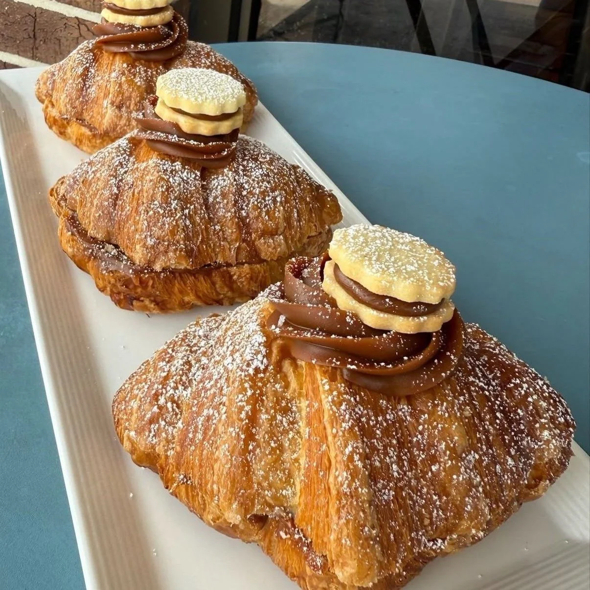 Our September special is back: the Dulce de Leche Croissant 🥐

A classic B&amp;B croissant filled with dulce de leche, topped with a little more dulce de leche, and finished with a mini alfajor cookie on top.

Available Fridays through Sundays, all 